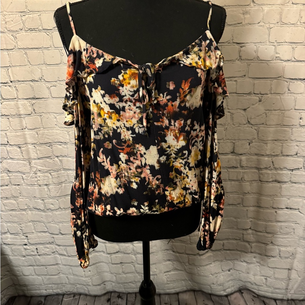 Women’s floral and black blouse